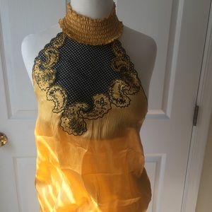 Bebe open back lace front blouse.